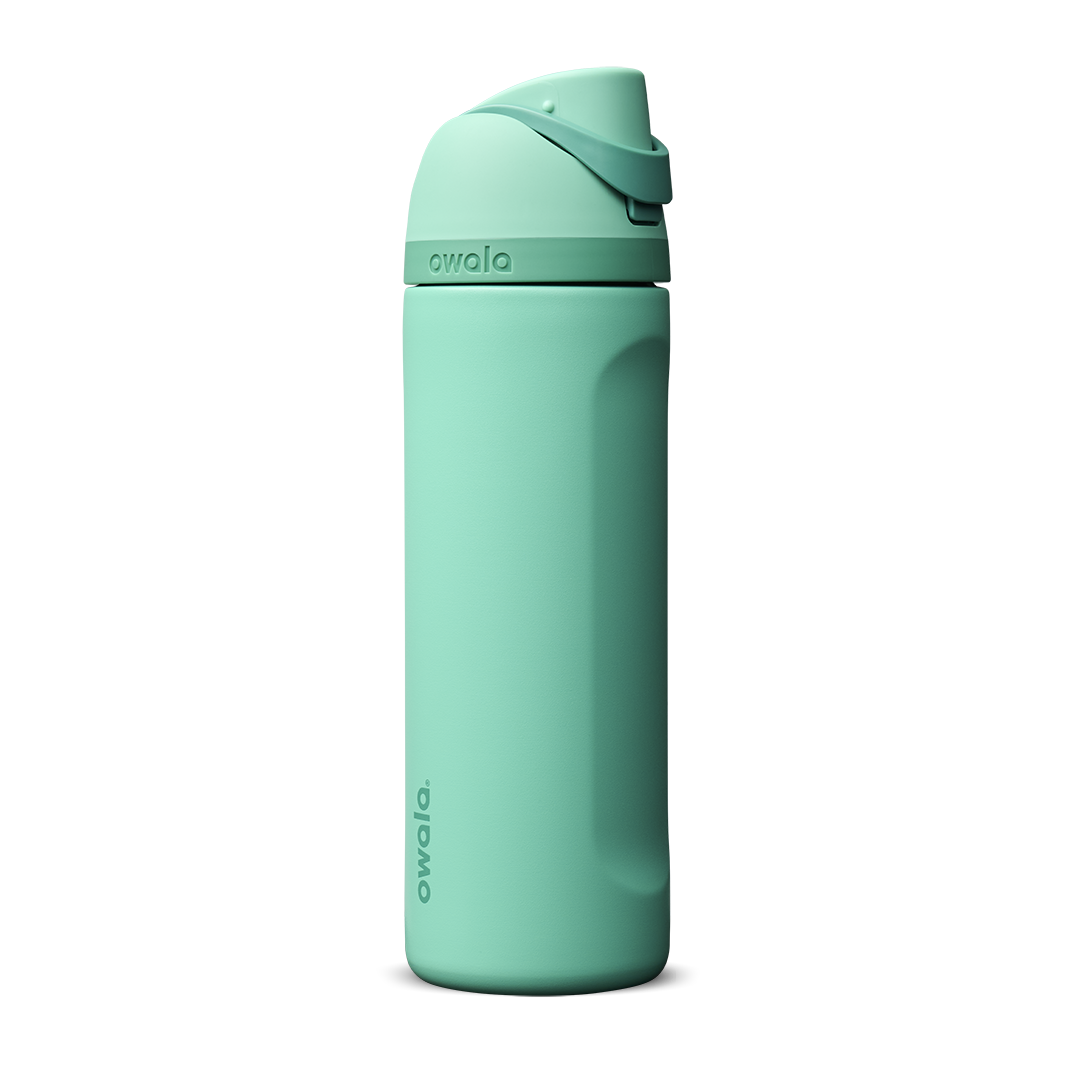 Owala FreeSip 24oz in 90s Kid, bright mint teal insulated bottle with matching teal flip cap and carry loop