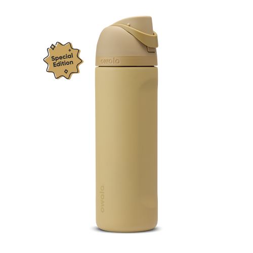 FreeSip 24oz Autumn Vista; warm sandy tan body with matching tan flip cap, lighter cream-tan carry loop, and tan lid