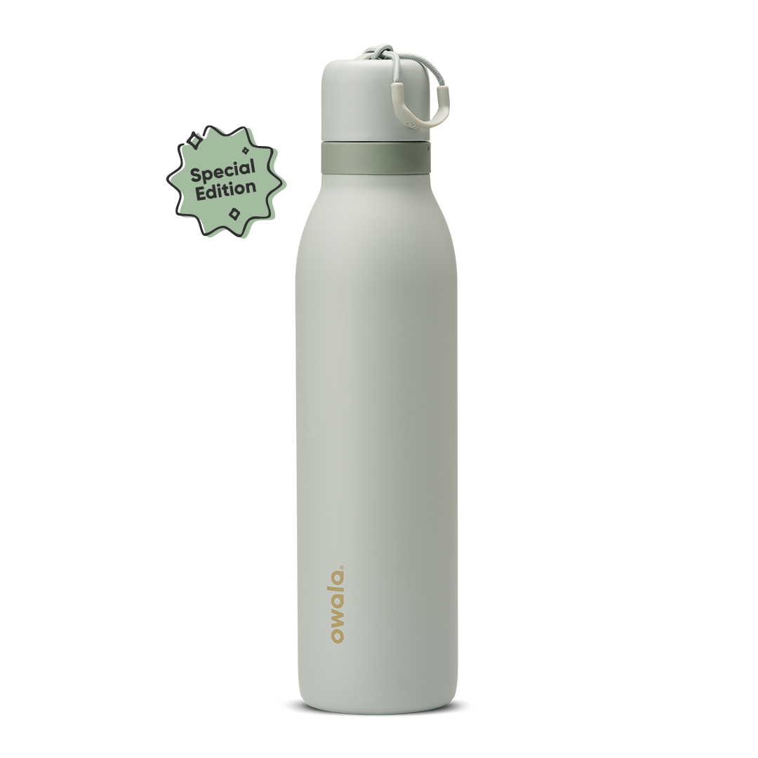 FreeSip Twist 24oz Summer Paradise; soft sage green body with matching pale sage twist cap, sage green twist cap accent band, and cream carry string with pale sage grip
