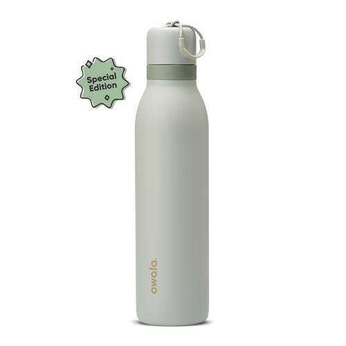 FreeSip Twist 24oz Summer Paradise; soft sage green body with matching pale sage twist cap, sage green twist cap accent band, and cream carry string with pale sage grip