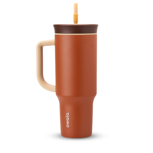 40oz Tumbler in Pumpkin Spice, burnt orange insulated tumbler with cream handle, dark chocolate brown lid, and orange-tipped straw